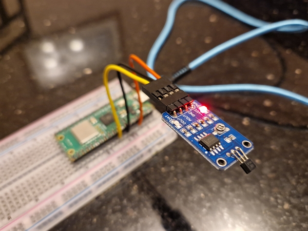 Raspberry Pi Pico W connected to a Hall sensor