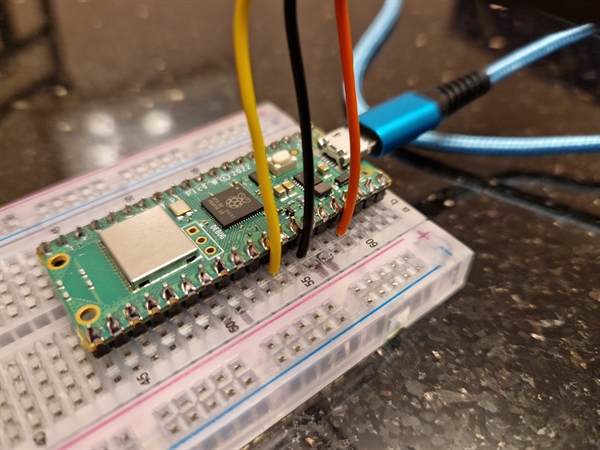 Raspberry Pi Pico W connected to a Hall sensor